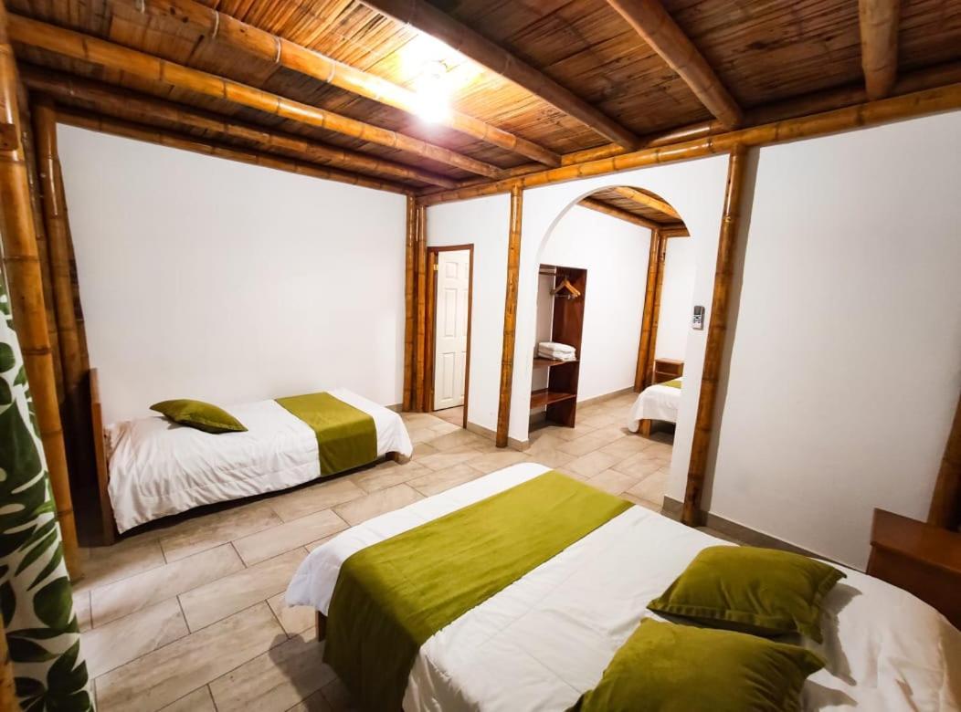 Tuzco Lodge ปูแอร์โตโลเปซ ภายนอก รูปภาพ