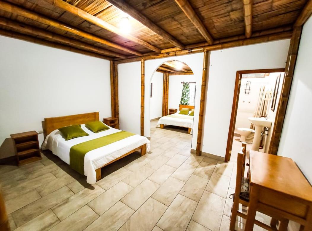 Tuzco Lodge ปูแอร์โตโลเปซ ภายนอก รูปภาพ